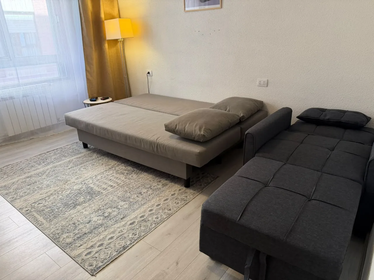 Sofá cama y sillón cama abiertos